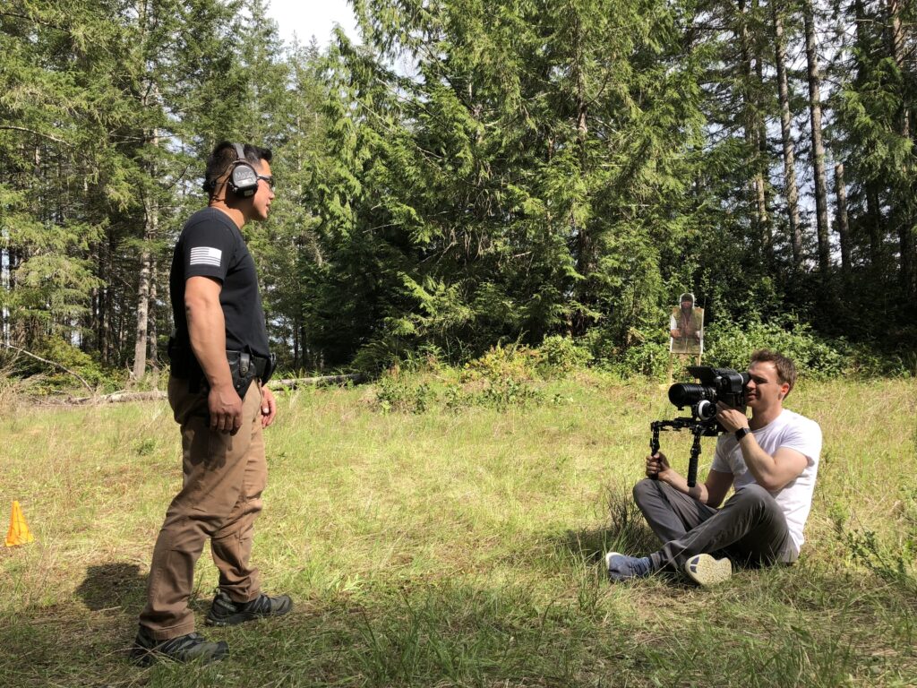man with camera Safariland film shoot